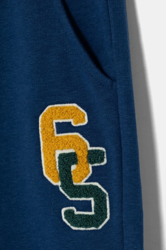 Chłopiec United Colors of Benetton spodnie dresowe dziecięce 32N4GF03X.P.Seasonal granatowy