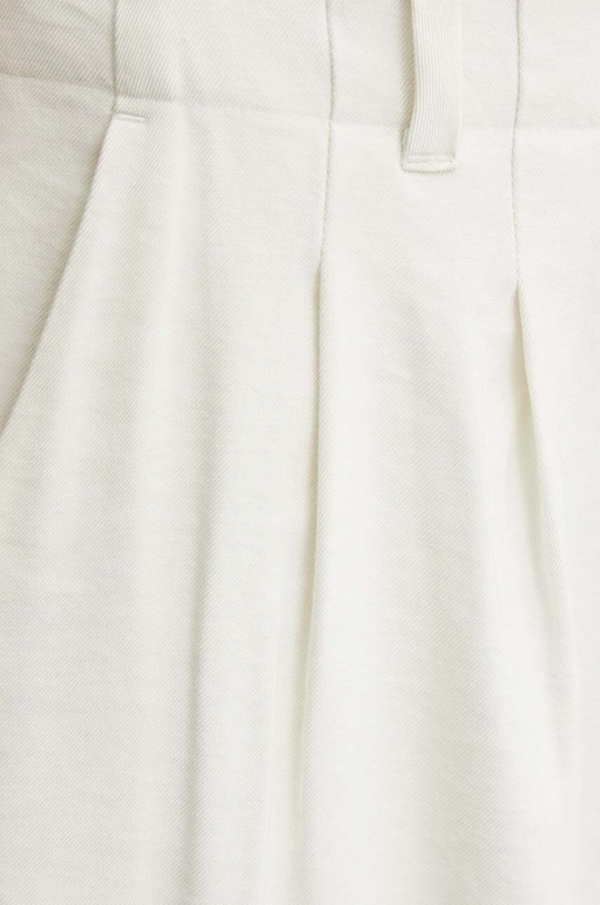 Штани Calvin Klein Jeans бежевий J20J223917