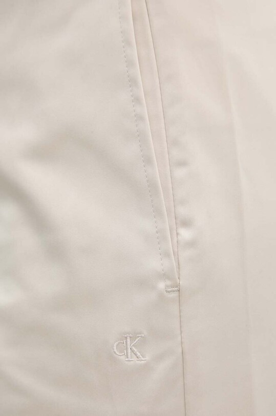 Kalhoty Calvin Klein Jeans J20J223921 béžová