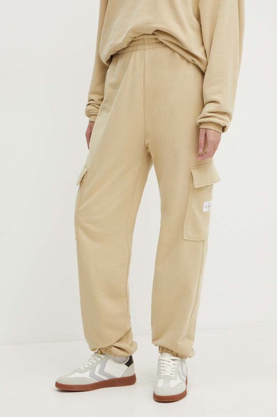 Bavlnené tepláky Calvin Klein Jeans bavlna béžová J20J223589