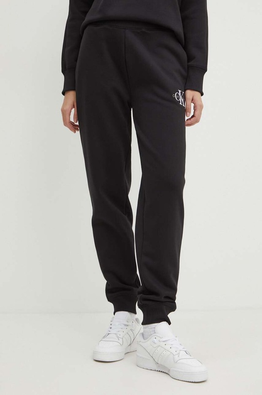 Tepláky Calvin Klein Jeans pletenina černá J20J223590