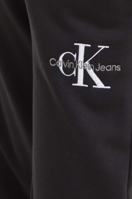 Tepláky Calvin Klein Jeans černá J20J223590