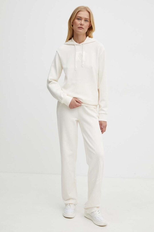 Бавовняні спортивні штани Armani Exchange 6DYP80.YJFZZ бежевий AW24