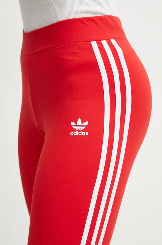 adidas Originals legginsy Flared czerwony IY7199