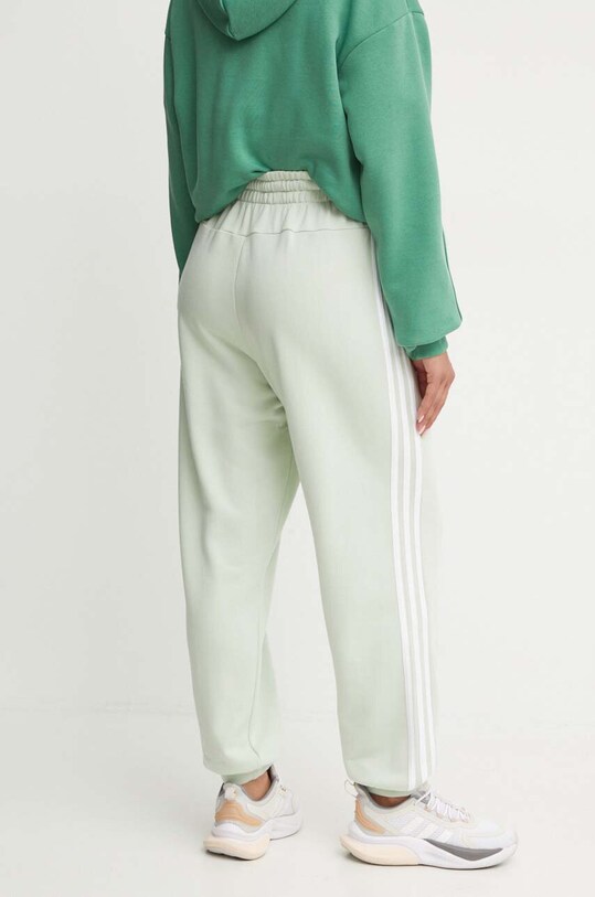 Oblečení Bavlněné tepláky adidas Essentials IY4236 zelená