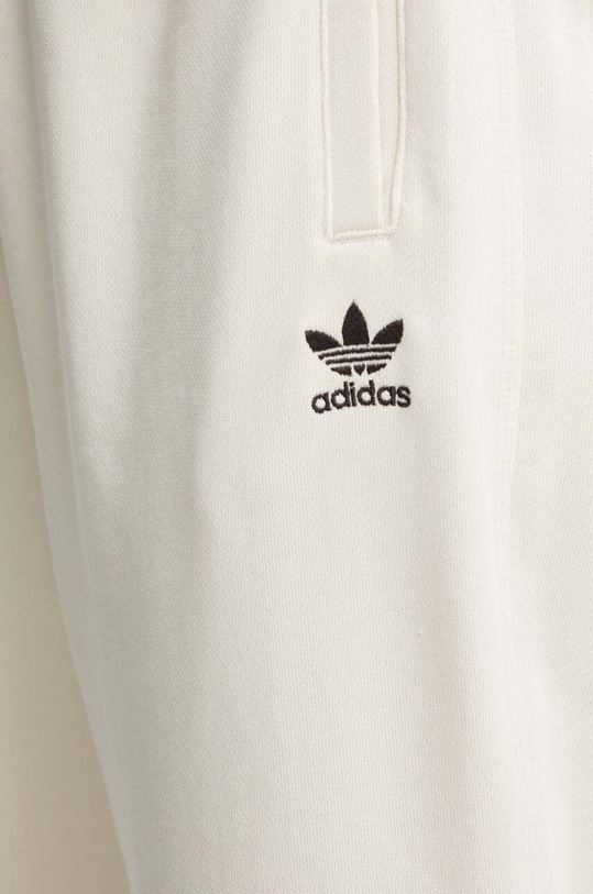 Хлопковые спортивные штаны adidas Originals бежевый IY4995