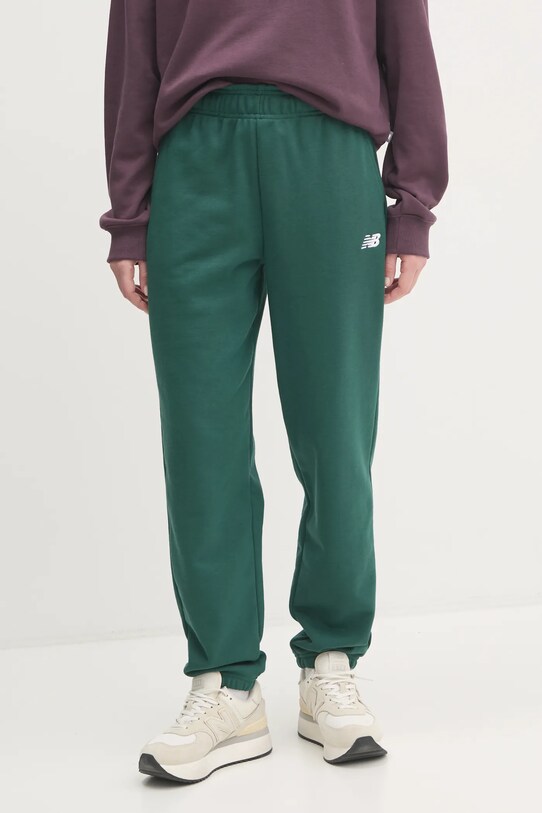 New Balance spodnie dresowe dzianina zielony WP41500NWG