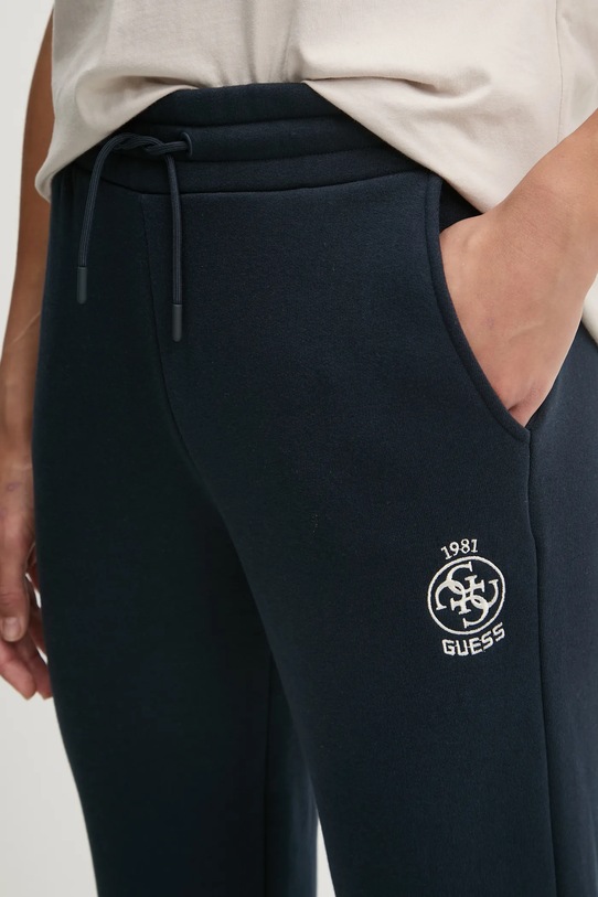 Tepláky Guess NIA tmavomodrá V4BB06.KCHU1