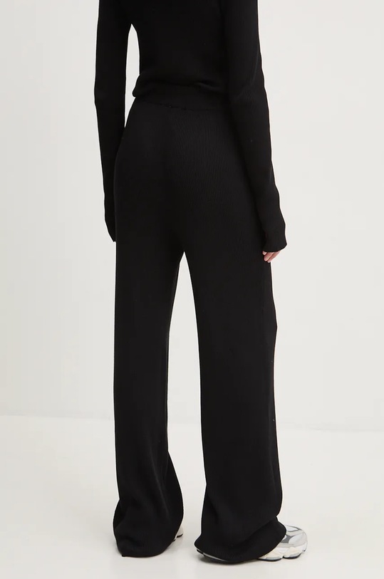 Îmbrăcăminte Karl Kani pantaloni de trening 61030022 negru