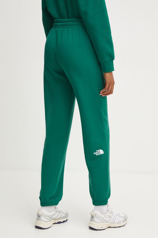 Odzież The North Face spodnie dresowe bawełniane Essential Jogger NF0A8A6KNL11 zielony