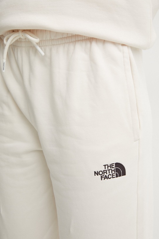 The North Face pantaloni de trening din bumbac Essential Jogger bej NF0A8A6KQLI1