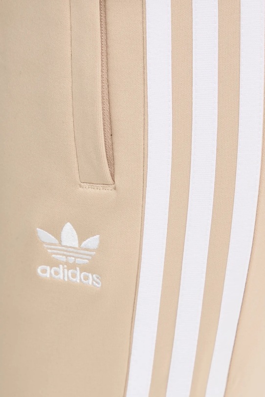 Tepláky adidas Originals Adicolor béžová IZ2837