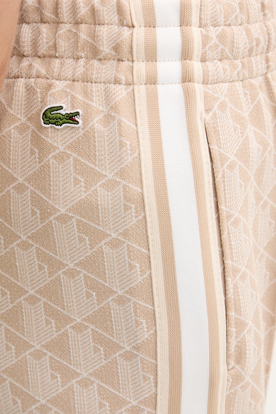Lacoste spodnie dzwony damskie beżowy XF9313
