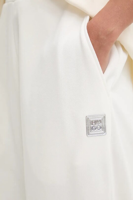 HUGO spodnie dresowe bawełniane beżowy 50528471