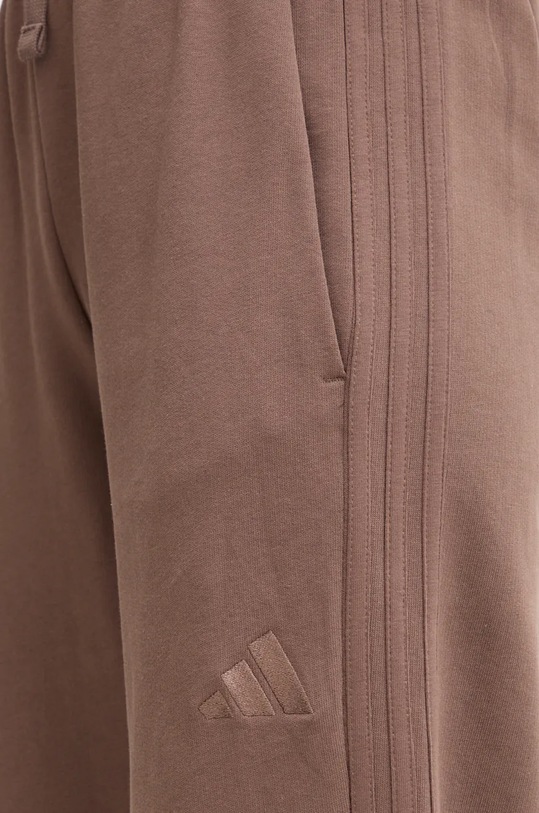 Бавовняні спортивні штани adidas All SZN коричневий JI9107