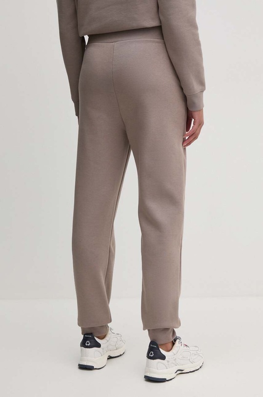 Odzież Calvin Klein spodnie dresowe K20K208330 beżowy