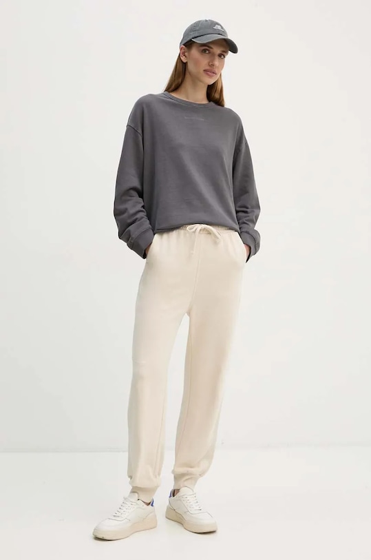 G-Star spodnie dresowe bawełniane D25407.D562 beżowy AW24