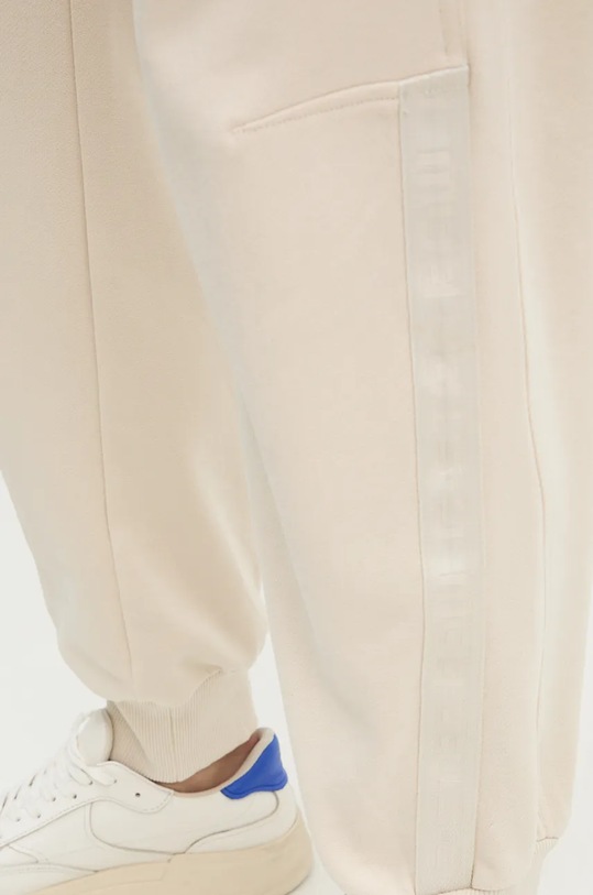 G-Star spodnie dresowe bawełniane beżowy D25407.D562