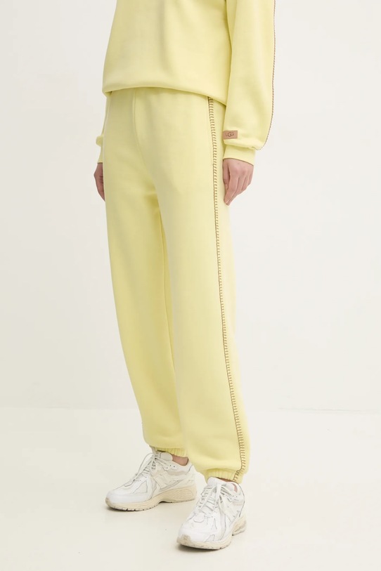 UGG spodnie dresowe 1158770 żółty AW24