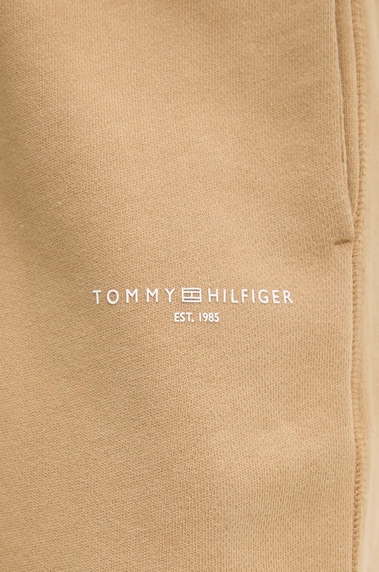 Bavlněné tepláky Tommy Hilfiger béžová WW0WW42883