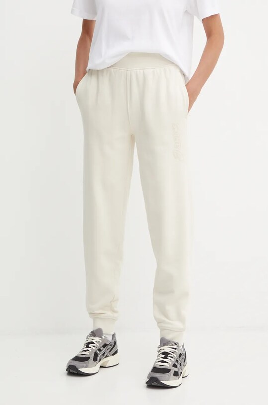 Asics spodnie dresowe dzianina beżowy 2032C844.200