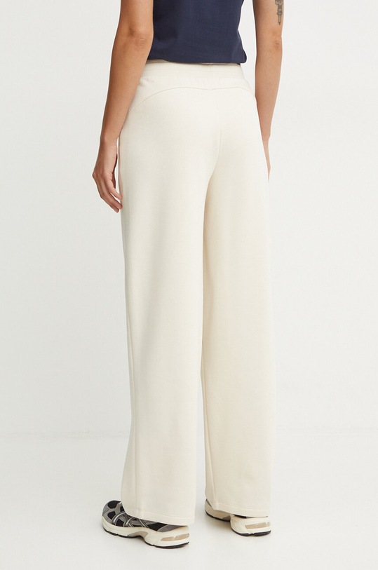 Odzież Puma spodnie dresowe 681694 beżowy