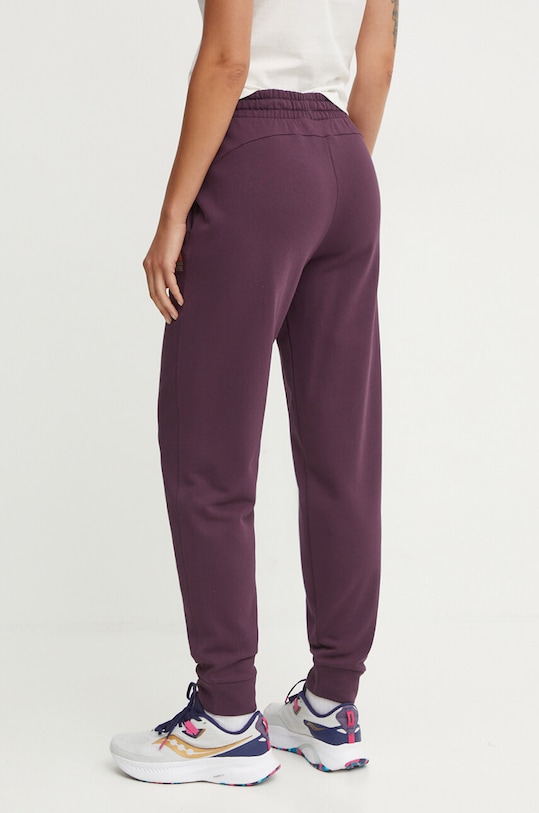 Odzież Puma spodnie dresowe 681932 fioletowy