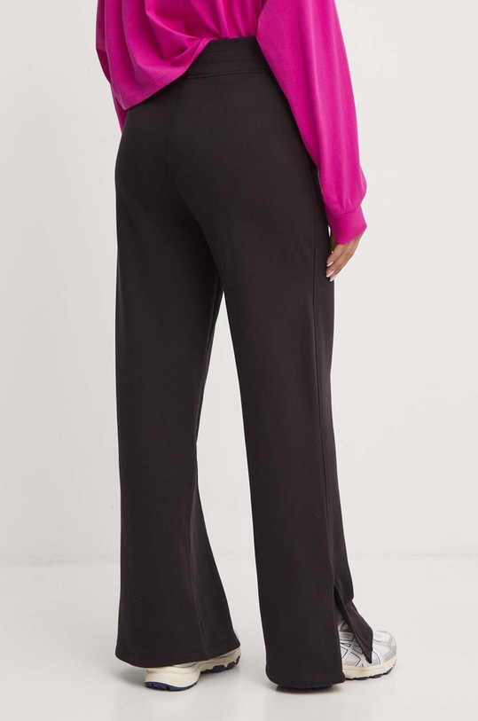 Odzież Puma spodnie dresowe bawełniane 682720 czarny