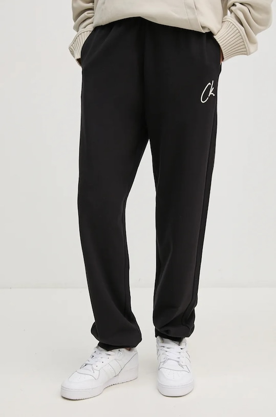 Хлопковые спортивные штаны Calvin Klein Jeans хлопок чёрный J20J224441