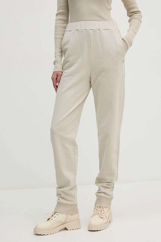 Хлопковые спортивные штаны Calvin Klein Jeans хлопок зелёный J20J224443