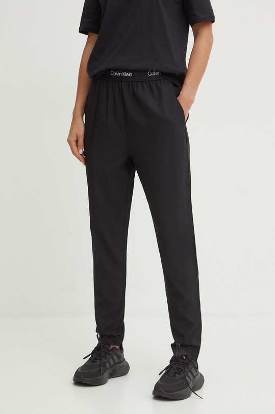 Tréninkové kalhoty Calvin Klein Performance medium černá 00GWS4P601