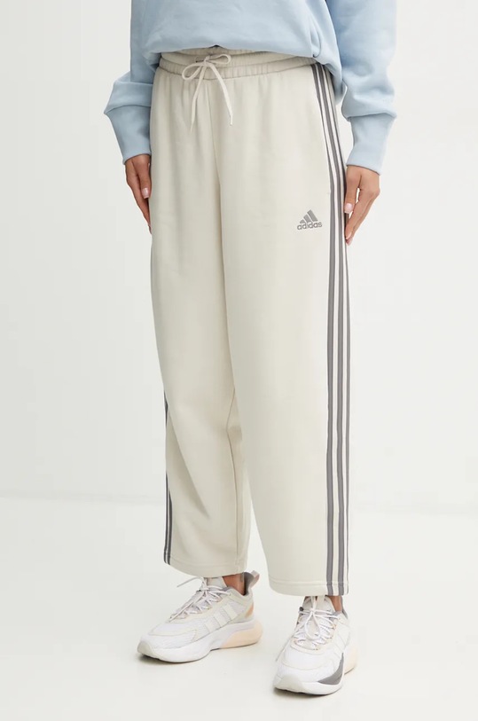 Спортивні штани adidas Essentials аплікація бежевий IY1744