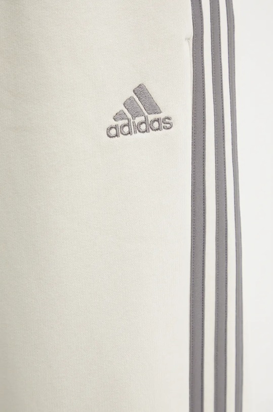 Спортивні штани adidas Essentials бежевий IY1744