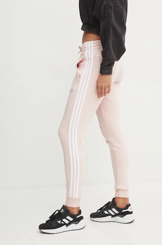 Бавовняні спортивні штани adidas Essentials рожевий JH3689