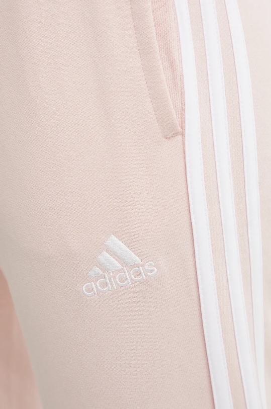 Бавовняні спортивні штани adidas Essentials JH3689 рожевий