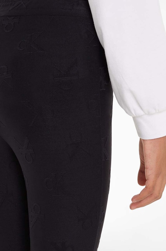 Dětské kalhoty Calvin Klein Jeans JACQUARD FLARE IG0IG02689.9BYH.128.176