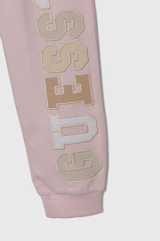 Dziewczynka Guess spodnie dresowe bawełniane J4YQ14.KA6R3.9BYH beżowy