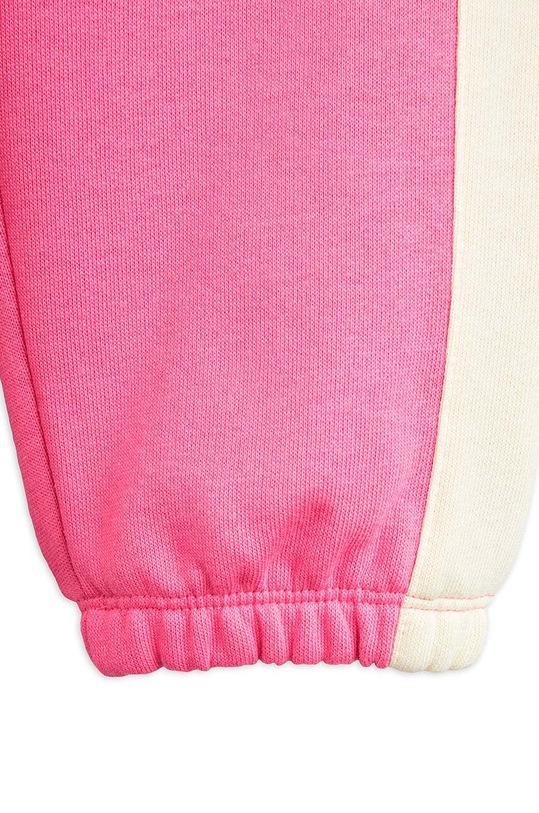 Mini Rodini spodnie dresowe bawełniane dziecięce 2473011228 różowy