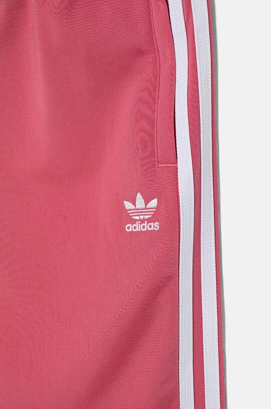 Дитячі спортивні штани adidas Originals SST TRACK PANTS рожевий IY7462