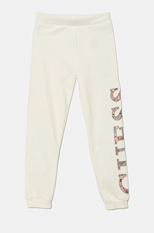 Guess spodnie dresowe bawełniane dziecięce aplikacja beżowy J4BQ11.KAX73.9BYH