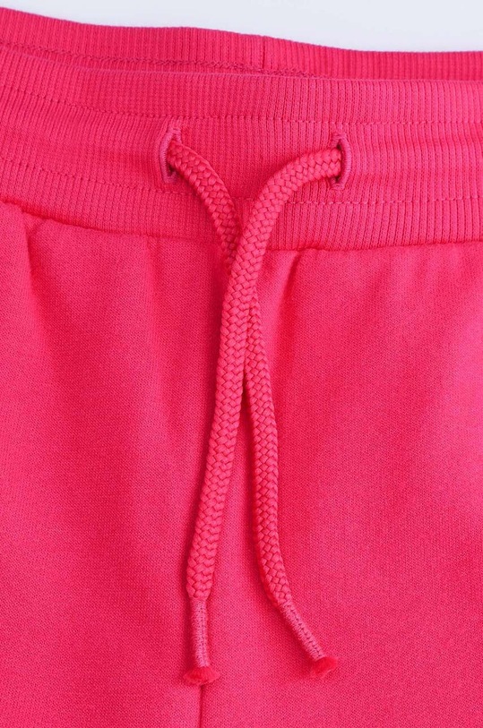 Coccodrillo spodnie dresowe bawełniane dziecięce różowy ZC4120201VGA