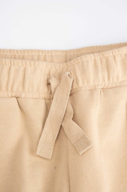 Момиче Детски памучен панталон Coccodrillo ZC4120101RGJ бежов