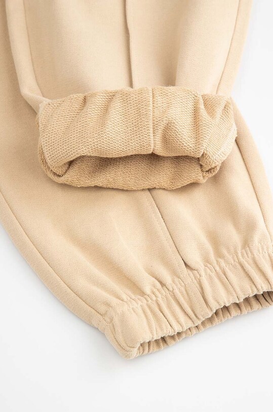 Детски памучен панталон Coccodrillo бежов ZC4120101RGJ