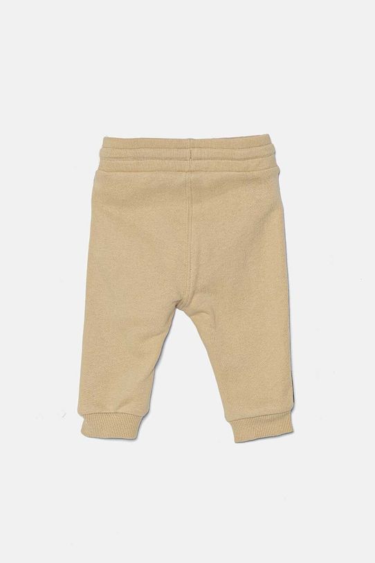 Calvin Klein Jeans spodnie dresowe bawełniane niemowlęce IN0IN00194.9BYH beżowy AW24