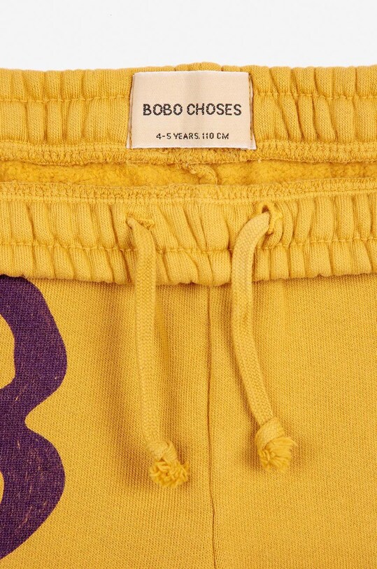 Bobo Choses spodnie dresowe bawełniane dziecięce żółty 224AC076