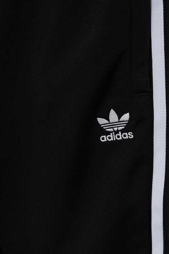 Дитячі спортивні штани adidas Originals SST TRACK PANTS чорний IX7630