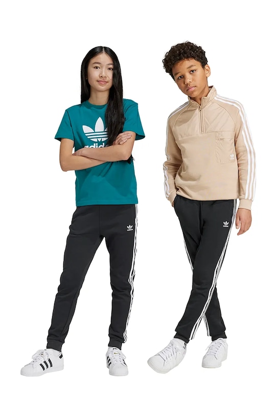 adidas Originals pantaloni de trening pentru copii TREFOIL PANTS tricotaj negru IY7484