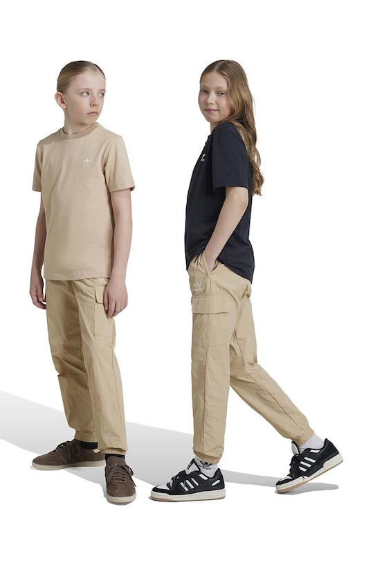 Dětské tepláky adidas Originals CARGO PANTS látka béžová IX7620