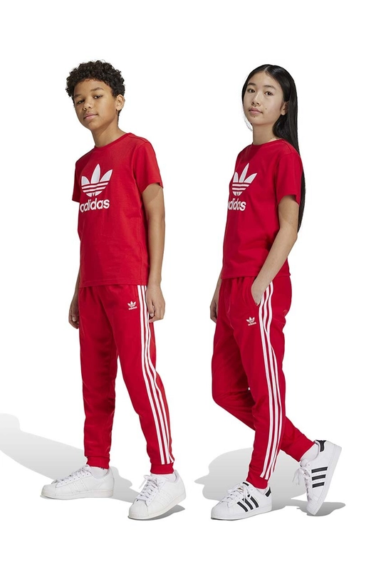 adidas Originals spodnie dresowe dziecięce SST TRACK PANTS dzianina czerwony IX7631