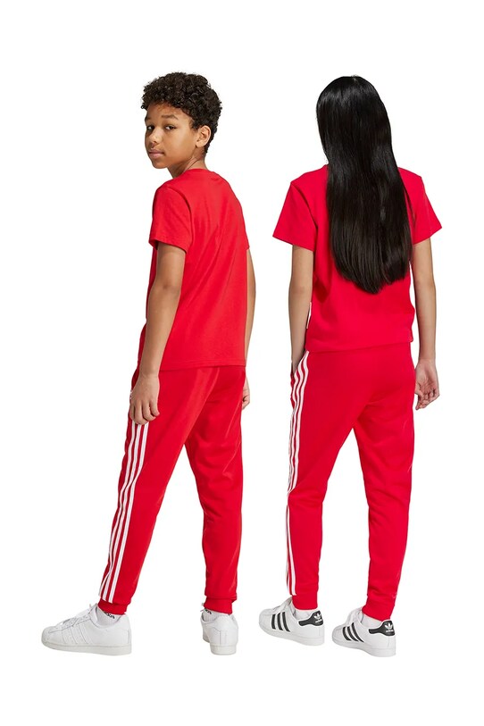 Дитячі спортивні штани adidas Originals SST TRACK PANTS IX7631 червоний